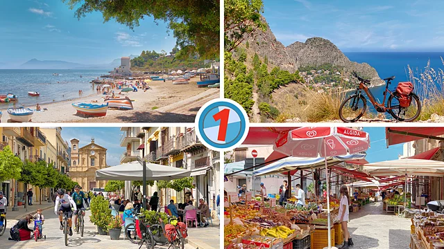 View of a harbor with several boats moored and a seagull flying in the bright sky above